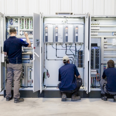 A photo of electrical technicians working, AdeptAg provides industry-leading Electrical & Controls Solutions